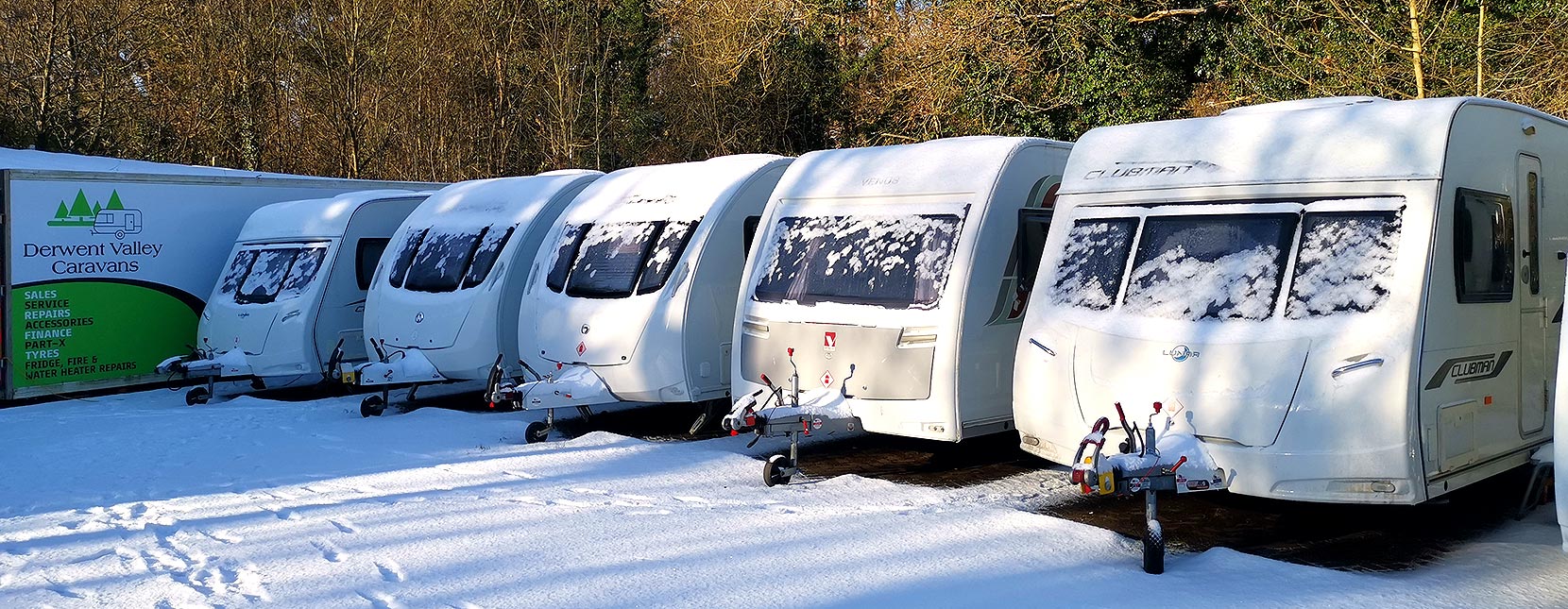 Caravans with snow covering at Derwent Valley Caravans